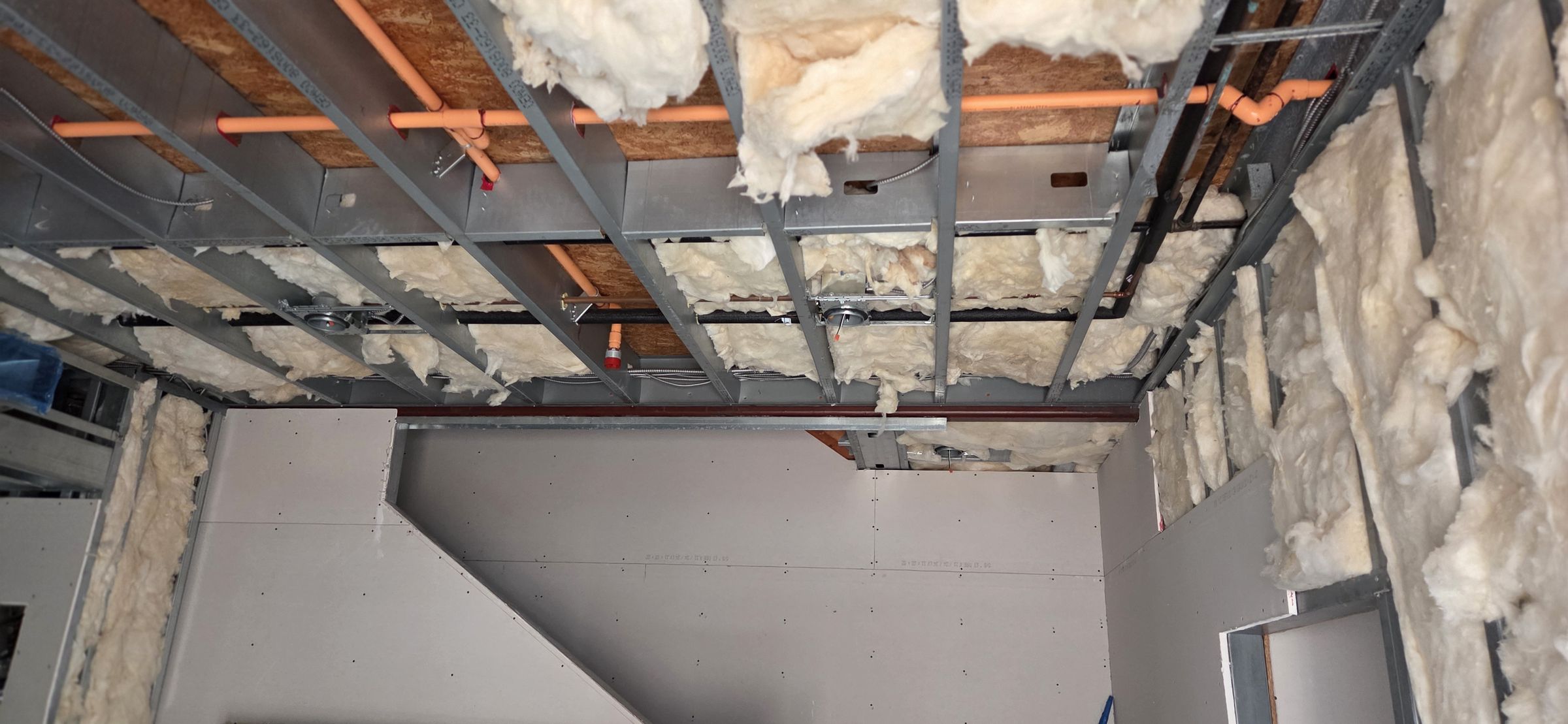 Board cut in and finished into an existing ceiling plane on a San Diego repair
