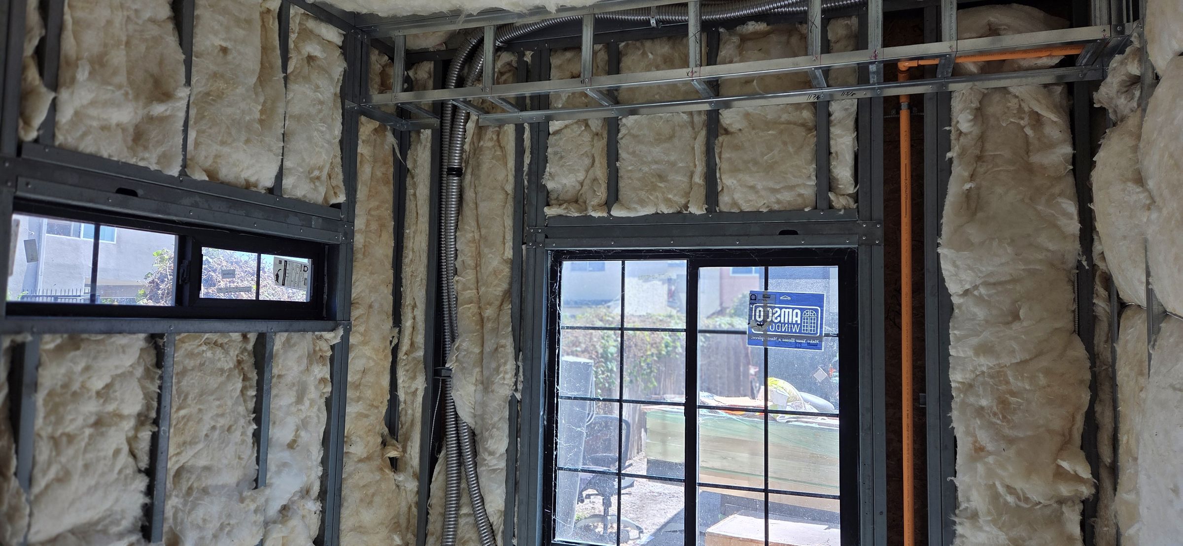 Framing detailed around storefront glazing on a commercial fit-out
